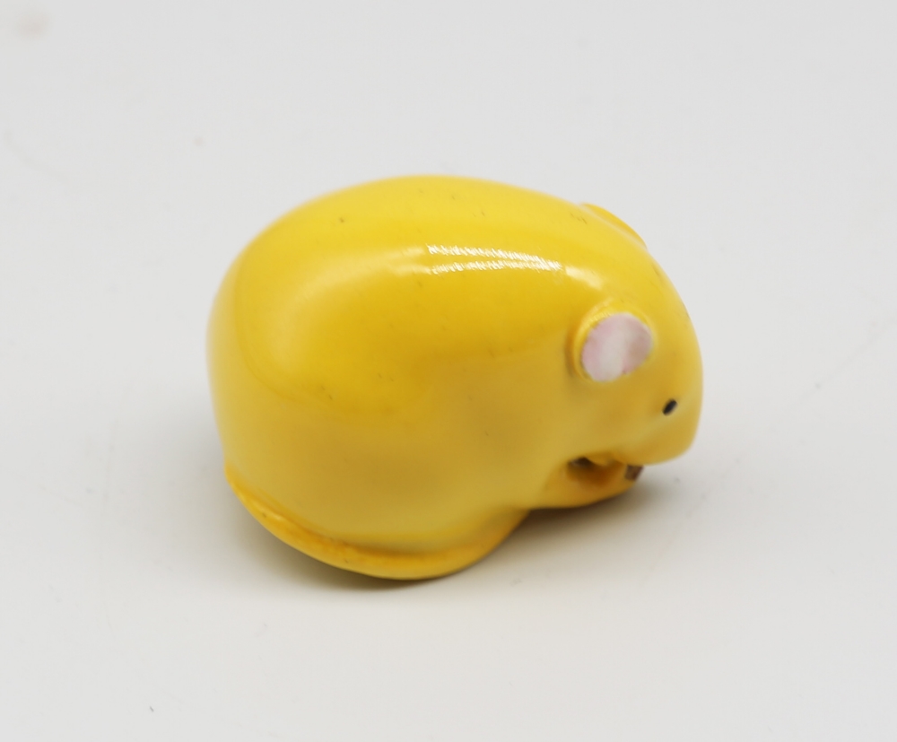 A Royal Worcester netsuke modelled as a mouse with nut in hands, yellow colourway, early to mid 20th - Image 2 of 3