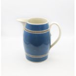 A large pearlware pitcher, blue ground with black and white checkered bands.  Benton collection