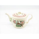 A Leeds creamware cylindrical teapot and cover, painted in bright enamels with exotic birds on rocky