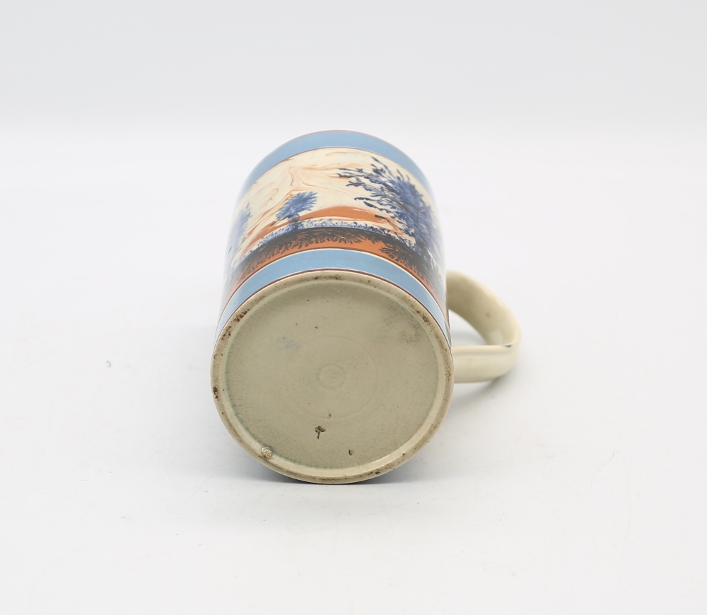 A mocha cylindrical mug, with blue feathered blue trees and a tan and black landscape and wide - Image 6 of 6