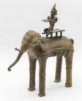 A late 19th/20th century West African (Ashanti/Akan) bronze elephant with rider, of abstract form