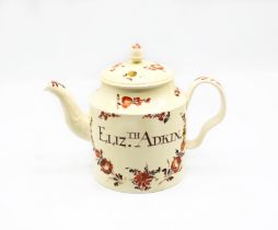 A Staffordshire Creamware William Greatbatch cylindrical teapot and cover, with an ear shaped handle