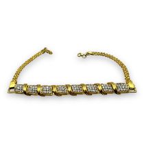 A diamond panel bracelet. Featuring 96 pave set round brilliant cut, averaging 1.2mm each, to an