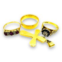 A collection of 18ct gold jewellery. Comprising an 18ct hallmarked gold band ring, size V; a ruby