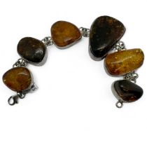 Freeform Baltic amber and silver panel bracelet. Featuring six variform panels bezel set and