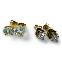 A pair of estimated 0.20 carat (total) 9ct gold diamond studs. Together with a pair of aquamarine