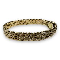 A 9ct gold articulated ladies herringbone bracelet. With box clasp and double figure of eight