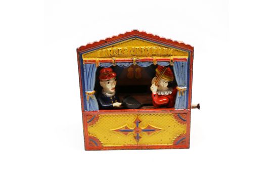 An early 20th century cast iron novelty money box, the "Punch & Judy Bank", with painted scene and - Image 1 of 7