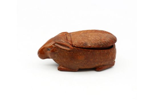 A late 18th/early 19th century carved coquilla nut snuff box, in the shape of a rabbit, glass bead - Image 1 of 6