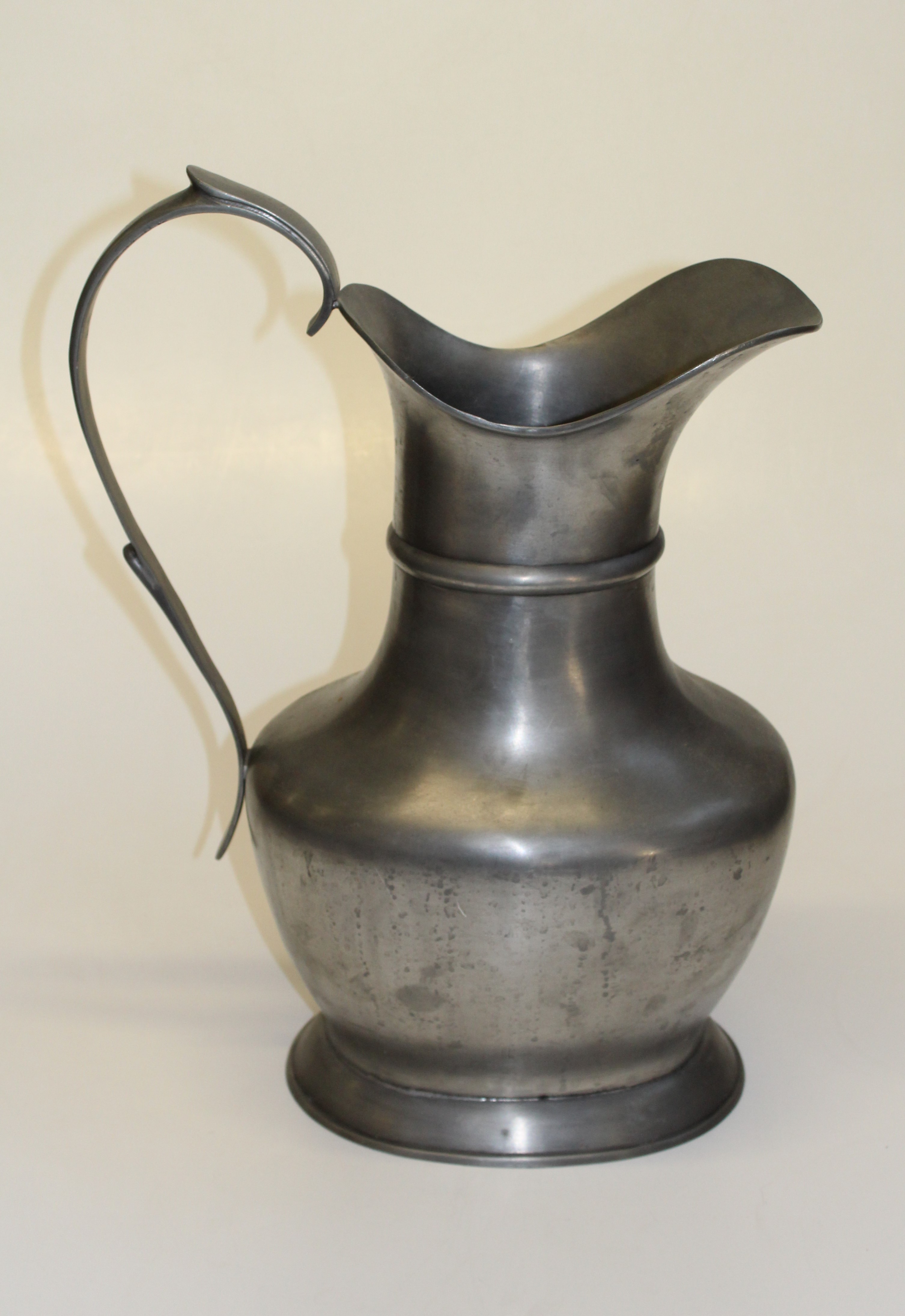 An Etain French pewter jug of massive proportions, 54.5 cm high