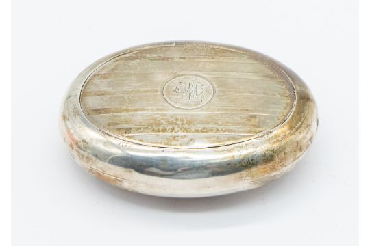 A George V oval silver snuff box, with engine turned banded designed top and circular initialled - Image 1 of 3