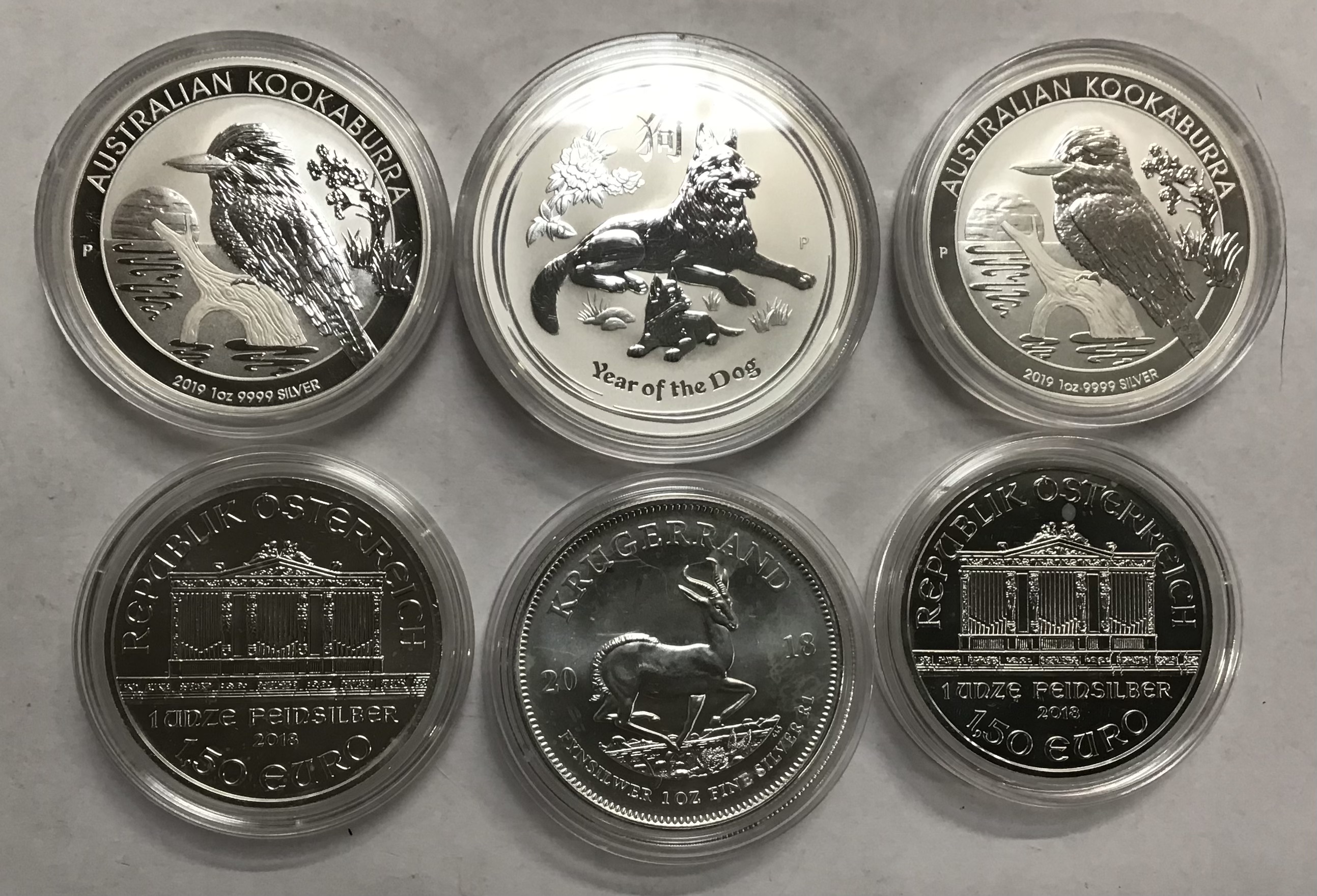 Mixed group of 1oz Fine Silver Coins of 3 x Australia, 2 x Austria and one South Africa. Includes