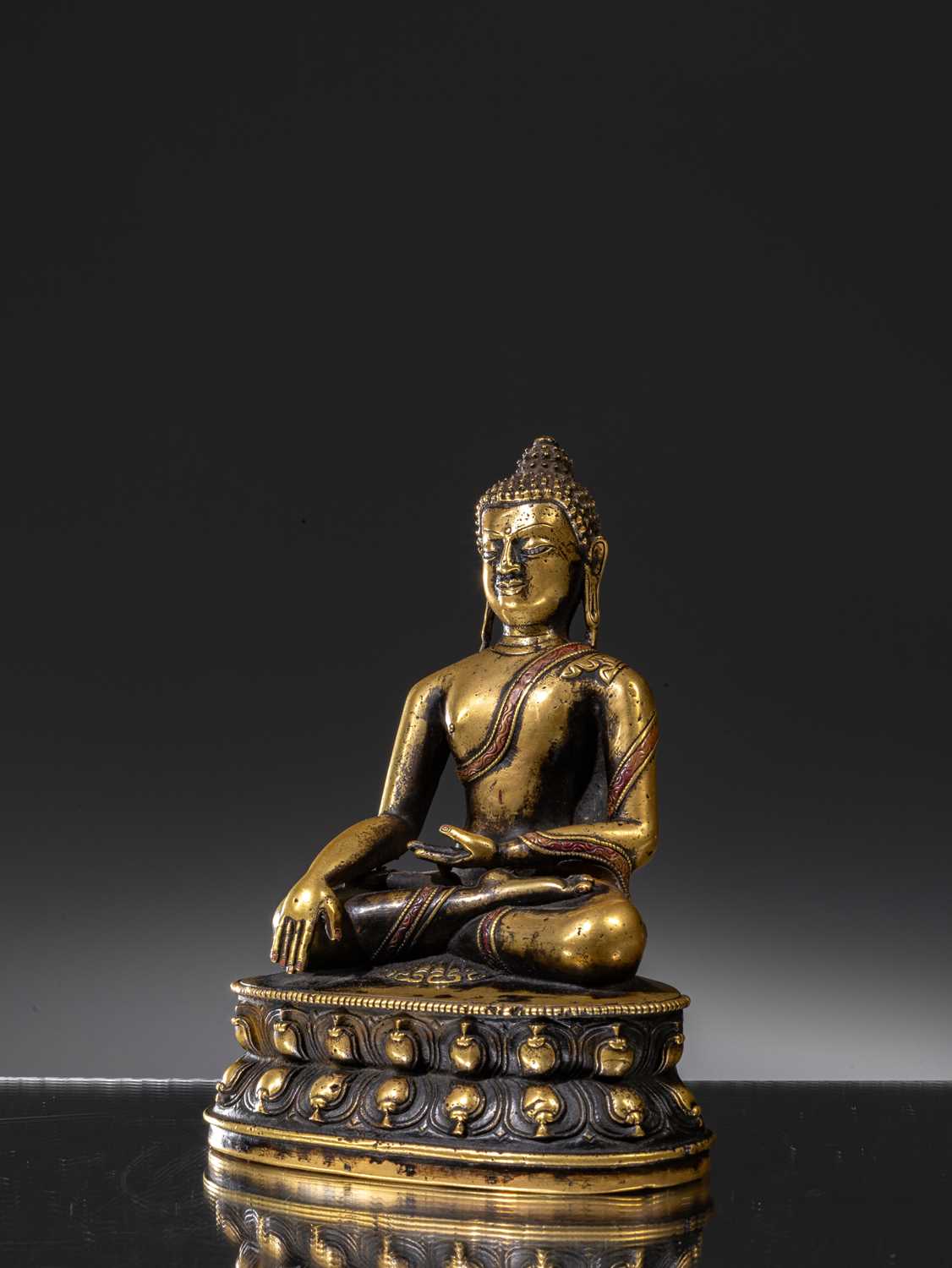 A LARGE SILVER AND COPPER INLAID BRONZE FIGURE OF SHAKYAMUNI BUDDHA, TIBET, 15TH CENTURY - Image 4 of 12