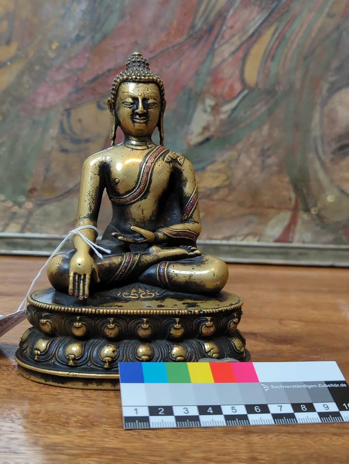 A LARGE SILVER AND COPPER INLAID BRONZE FIGURE OF SHAKYAMUNI BUDDHA, TIBET, 15TH CENTURY - Image 11 of 12