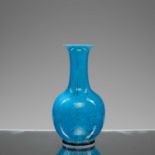 (R) A CHINESE TURQUOISE-GLAZED BOTTLE VASE