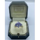 TANZANITE CLUSTER RING SET IN WHITE METAL