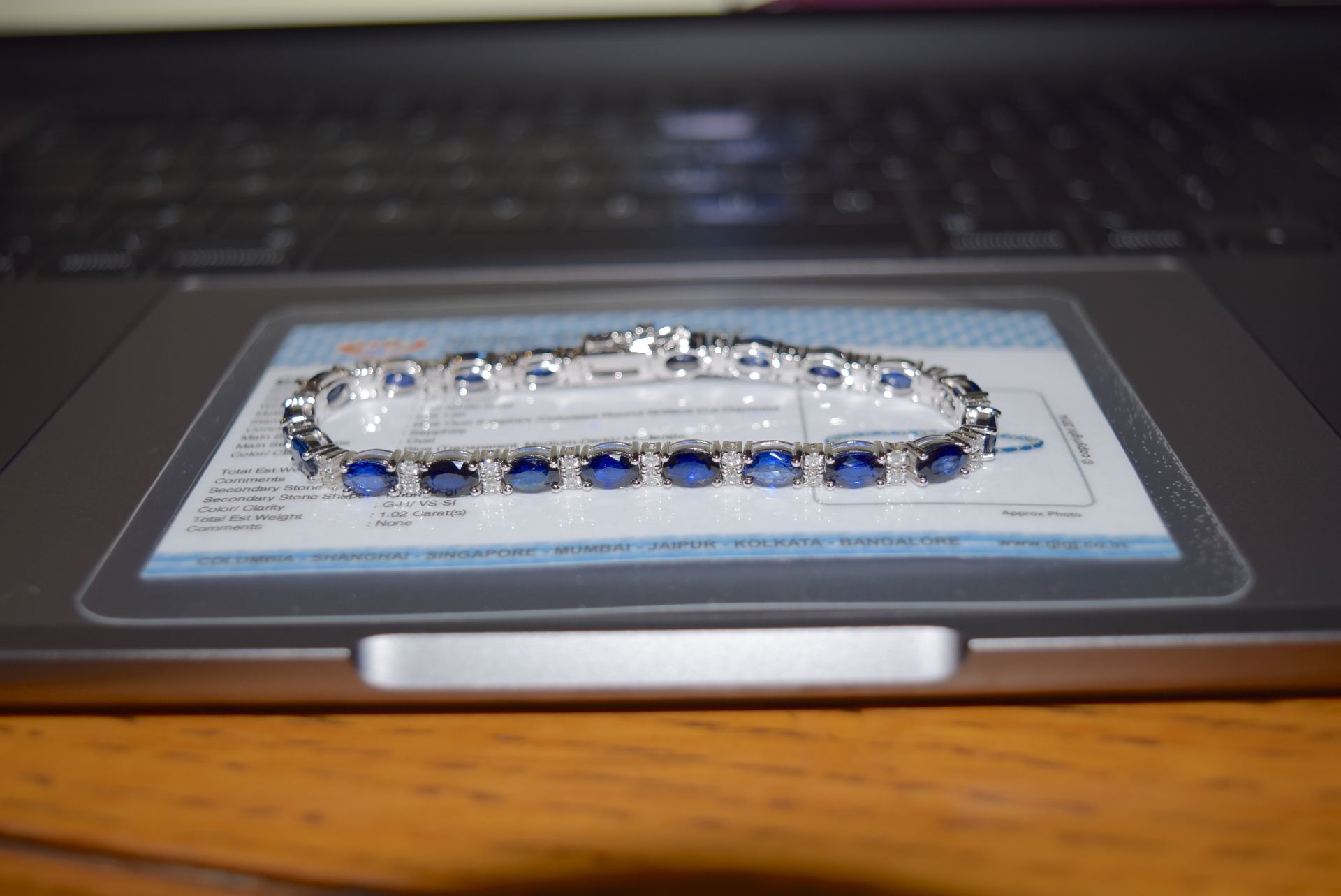 12.26CT BLUE SAPPHIRE & DIAMOND TENNIS BRACELET IN WHITE GOLD WITH BOX & CERTIFICATE CARD