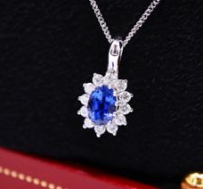 1.00CT DIAMOND AND 'VELVET BLUE' SAPPHIRE 18CT WHITE GOLD PENDANT