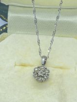 9ct WHITE GOLD DIAMOND SET FLOWER DESIGN PENDANT WITH 9ct GOLD CHAIN