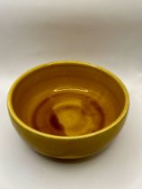 A very rare Liberty of London Art Nouveau Bowl. With beautiful orange colour.