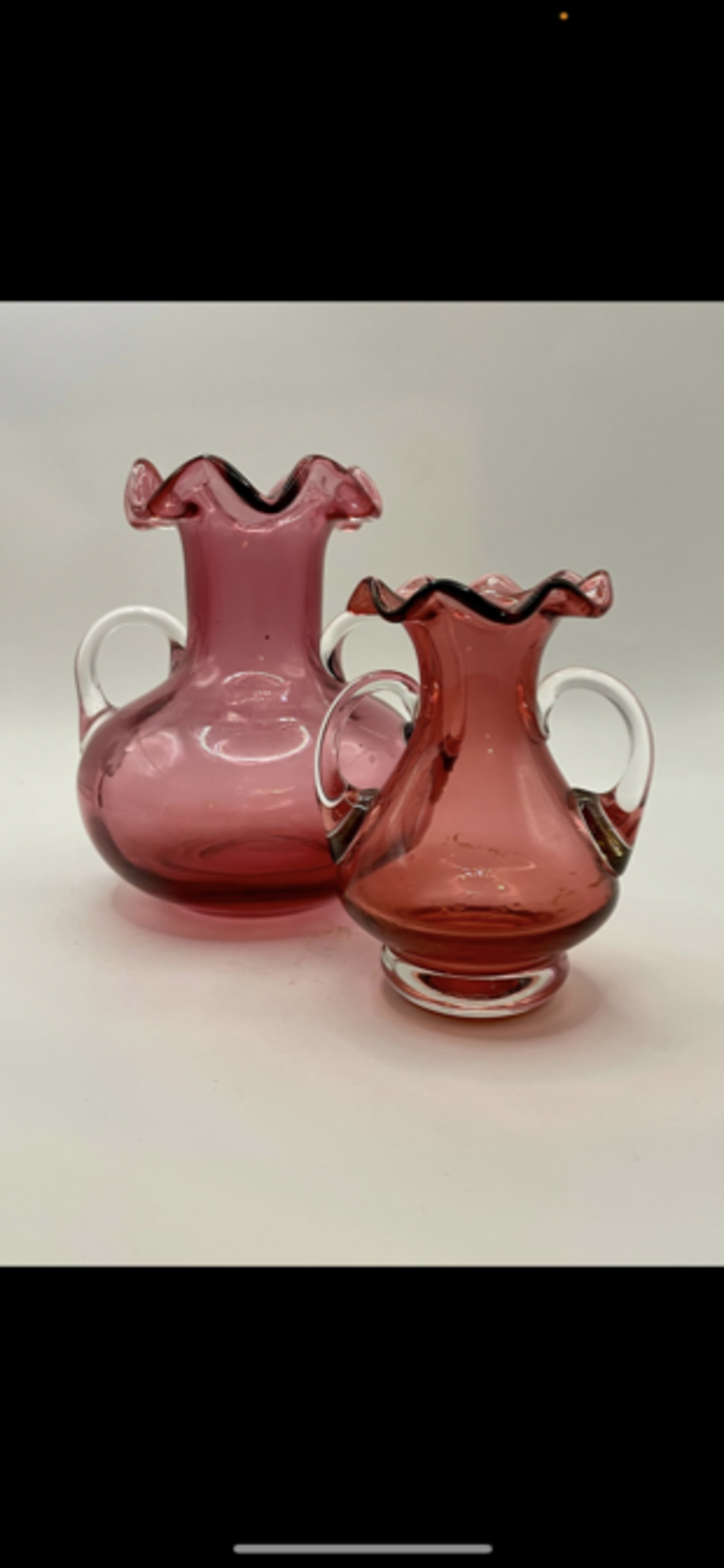 Two Antique Victorian cranberry vases. Both in excellent condition no chips or cracks.