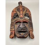 A wooden vintage hand carved African face mask. Great condition.&nbsp;