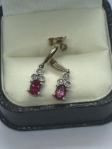 9ct GOLD RUBY AND DIAMOND EARRINGS APPROX. WEIGHT 2.75g