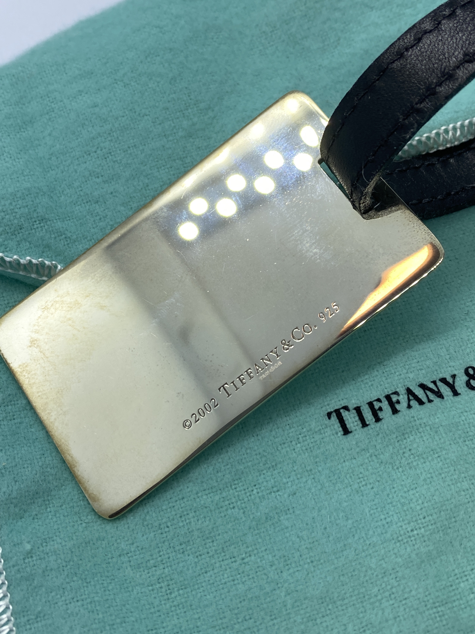TIFFANY AND CO 925 MARKED SILVER LUGGAGE TAG APPROX. WEIGHT 34.47g   - Image 2 of 3