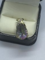 9ct GOLD MYSTIC TOPAZ AND DIAMOND PENDANT APPROX. WEIGHT 4g AND HEIGHT/ LENGTH 2.5cm