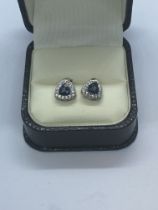 SAPPHIRE STYLE TRILLION SHAPED EARRINGS IN WHITE METAL