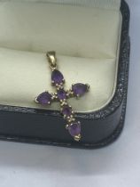 9ct AMETHYST AND DIAMOND CROSS PENDANT APPROX. WEIGHT 1.95g AND APPROX. HEIGHT 3cm