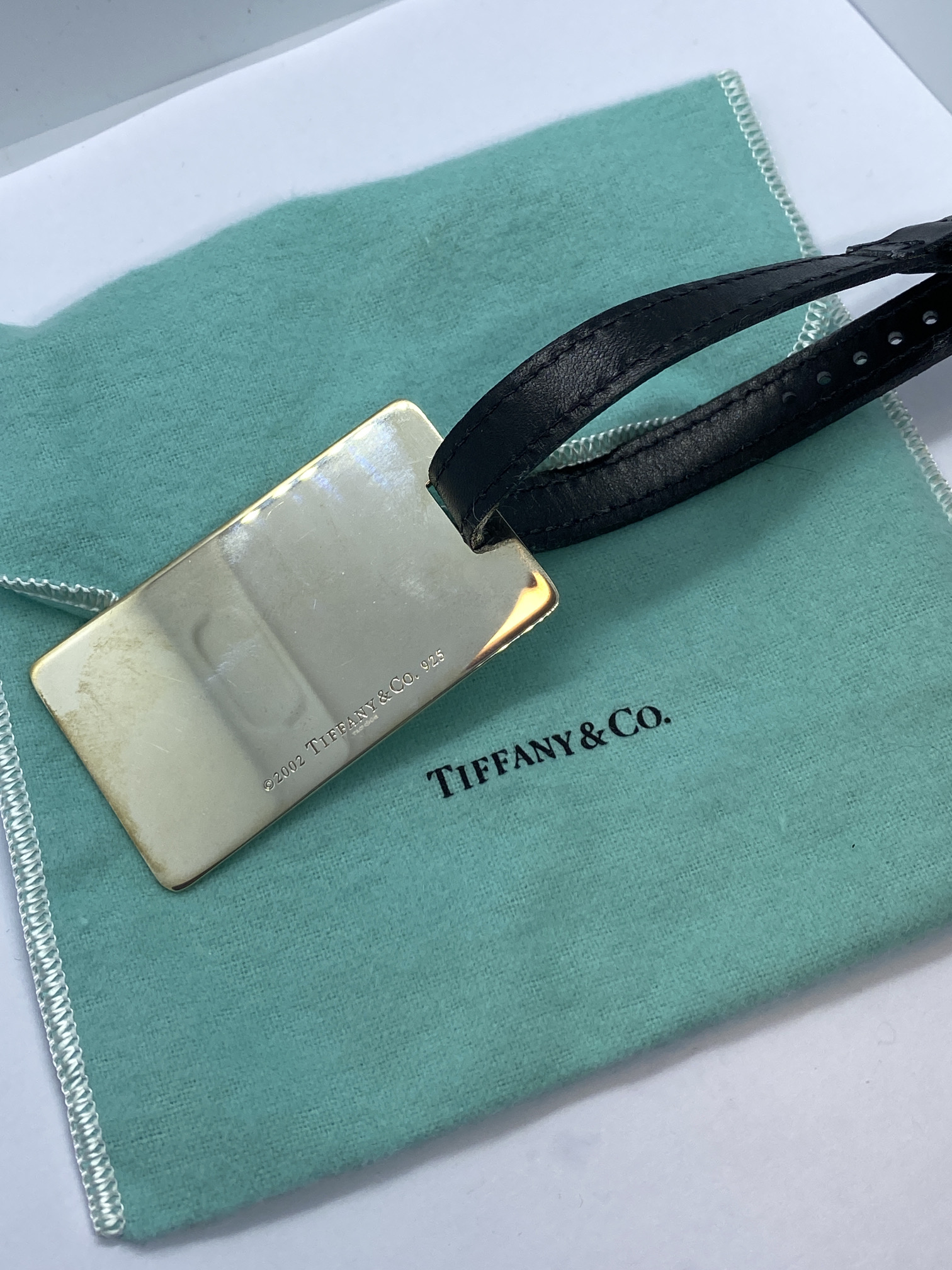 TIFFANY AND CO 925 MARKED SILVER LUGGAGE TAG APPROX. WEIGHT 34.47g  