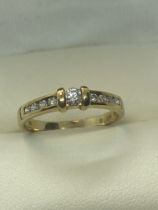 9ct GOLD 0.30ct DIAMOND RING APPROX. RING SIZE M AND APPROX. WEIGHT 1.90g