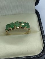 9ct YELLOW GOLD ZAMBIAN EMERALD AND DIAMOND RING APPROX. WEIGHT 1.95g APPROX. SIZE P 1/2
