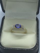 9ct YELLOW GOLD DIAMOND AND TANZANITE RING APPROX. WEIGHT 1.84g APPROX. SIZE Q