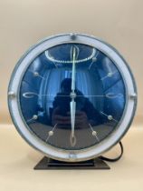 An Art deco Metamec clock with bronze attributes and Bakelite backing untested. Would need re-wiring