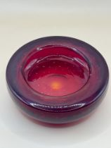 Heavy 1960s Murano cranberry controlled blown bubbled ashtray.