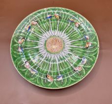 A beautiful 1800s Famille rose plate, Decorated with butterflies and floral designs. One small chip 