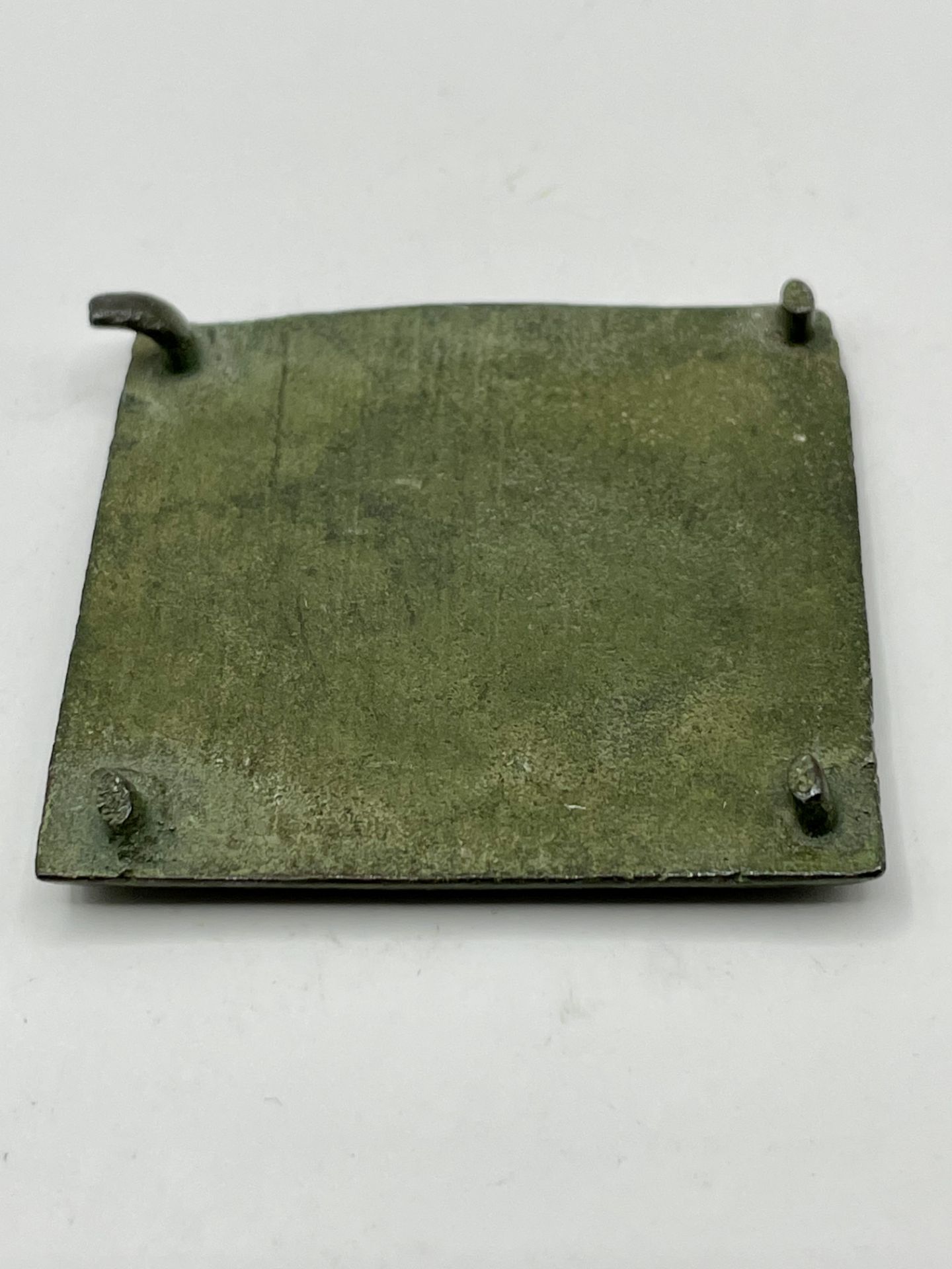 Roman Bronze Square leather Mount with the inscription I.T with floral design. - Image 3 of 4