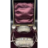 A J Bailey Victorian Hallmarked solid silver salts and spoons set in a velvet lined box.