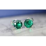 1.50CT EMERALD EAR STUDS *(950)* PLATINUM SETTINGS