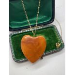 9ct GOLD BALTIC HEART SHAPEDAMBER PENDANT 1.2' X 1.2' AND CHAIN APPROX. LENGTH 16'