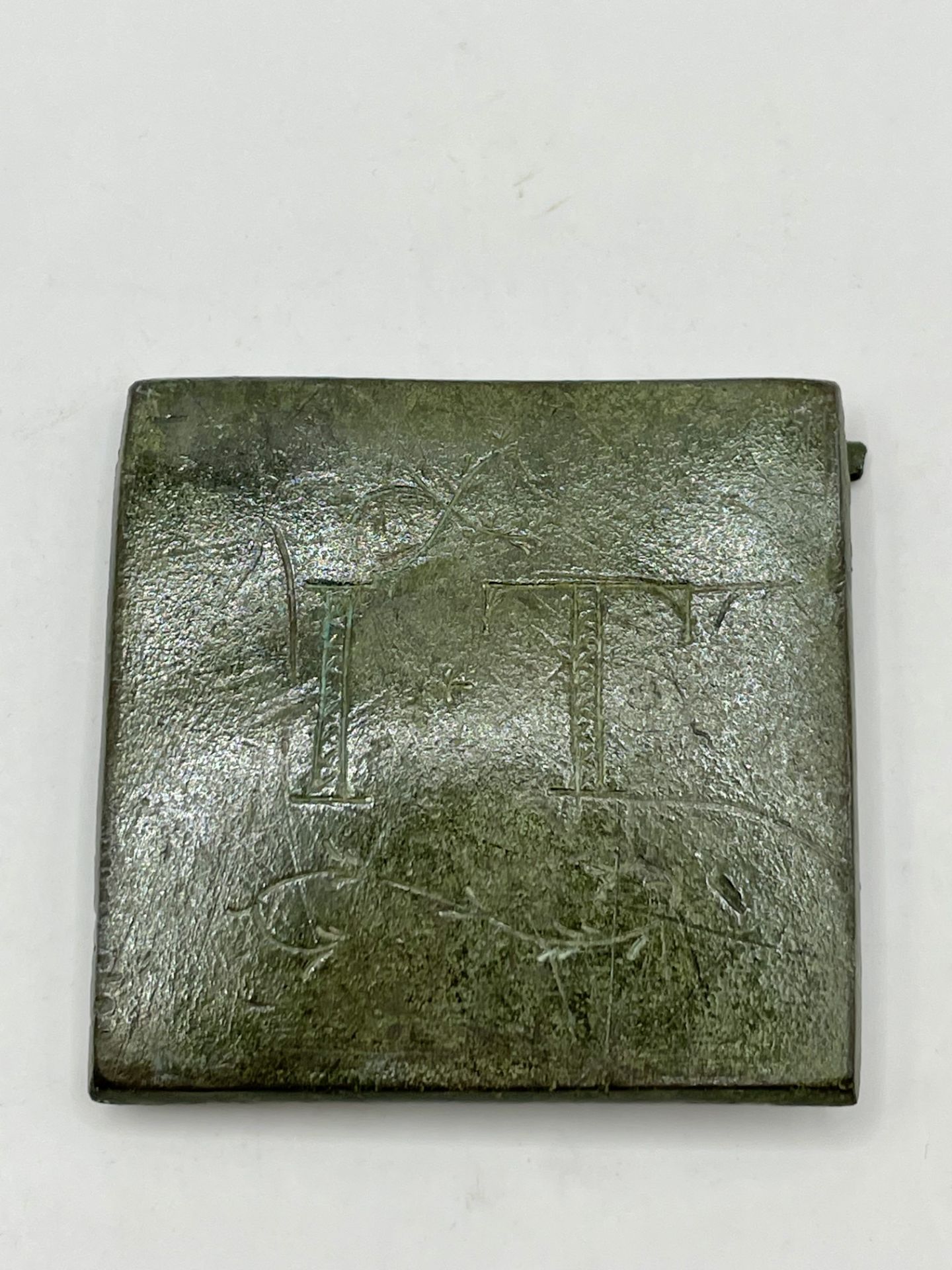 Roman Bronze Square leather Mount with the inscription I.T with floral design. - Image 2 of 4