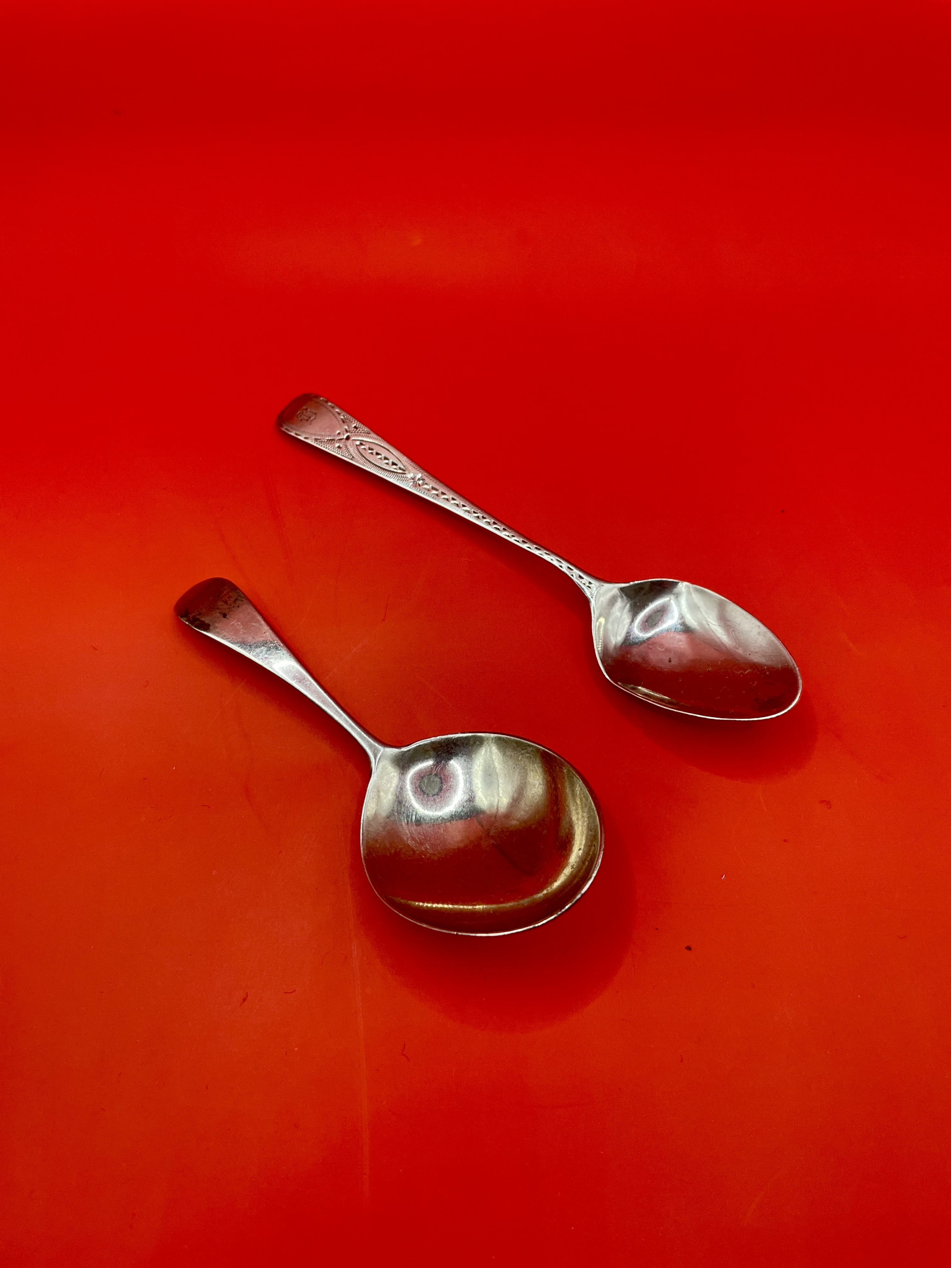 Two Georgian Silver Spoons with Georgian portrait mark.