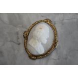 WHITE STONE CAMEO BROOCH in YELLOW METAL
