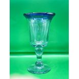 A hand blown Mexican Wine glass good features. Nice colours
