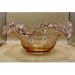 Very large ruffled light pink glass fruit bowl possibly Fentons marked berv to underneath.&nbsp;