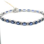 15.00CT SAPPHIRE AND DIAMOND TENNIS BRACELET in 18CT WHITE GOLD 
