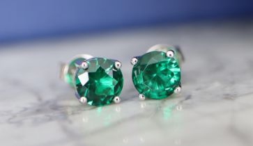 1.50CT EMERALD EAR STUDS *(950)* PLATINUM SETTINGS