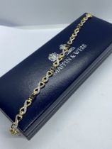 APPROX. 2.50ct BLUE SAPPHIRE AND DIAMOND SET BRACELET IN GOLD VERMEIL APPROX. 7.5'